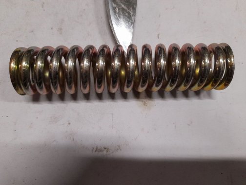 Hand controls spring
