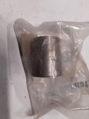 Lift arm bushing tapered